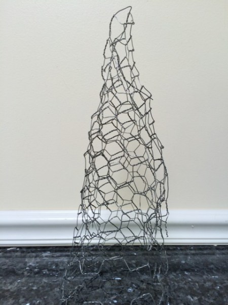 Chicken wire can easily be formed into a cone.